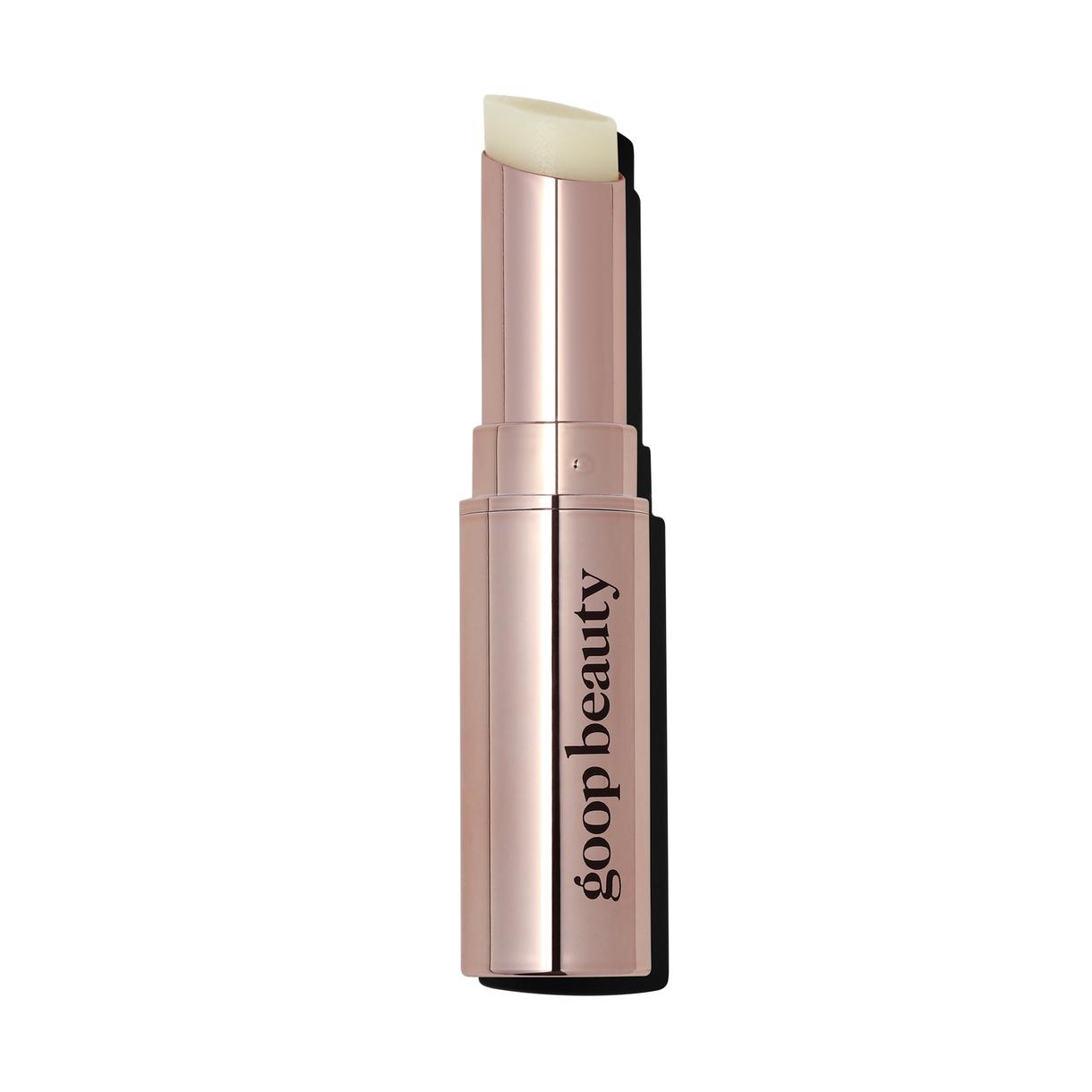 A tube of goop beauty Clean Nourishing Lip Balm against a plain background.