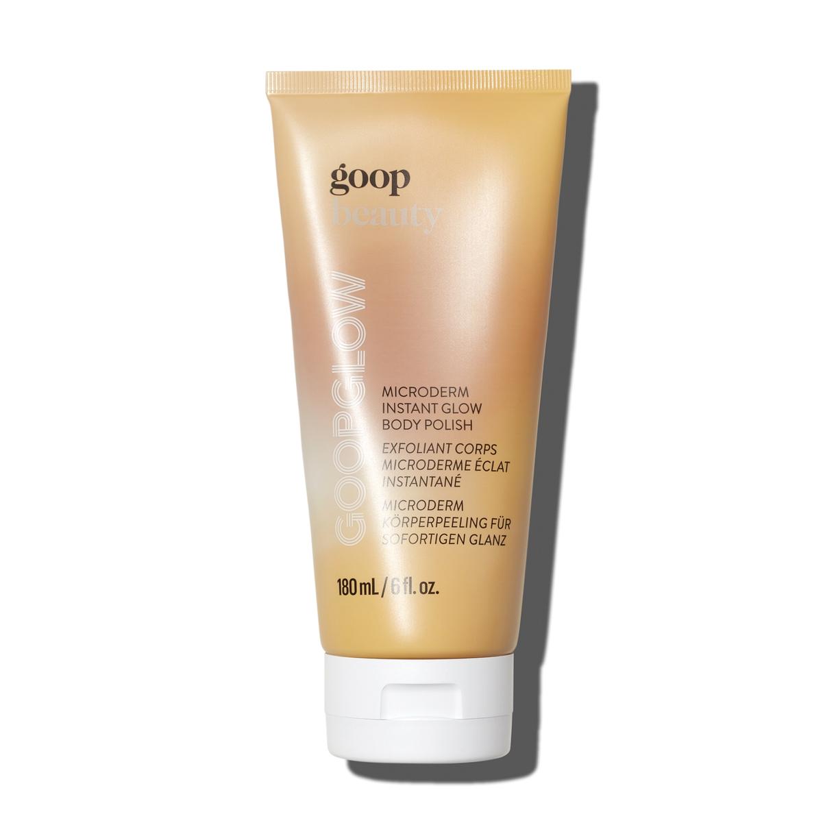 	A tube of goop beauty Microderm Instant Glow Body Polish against a light background.