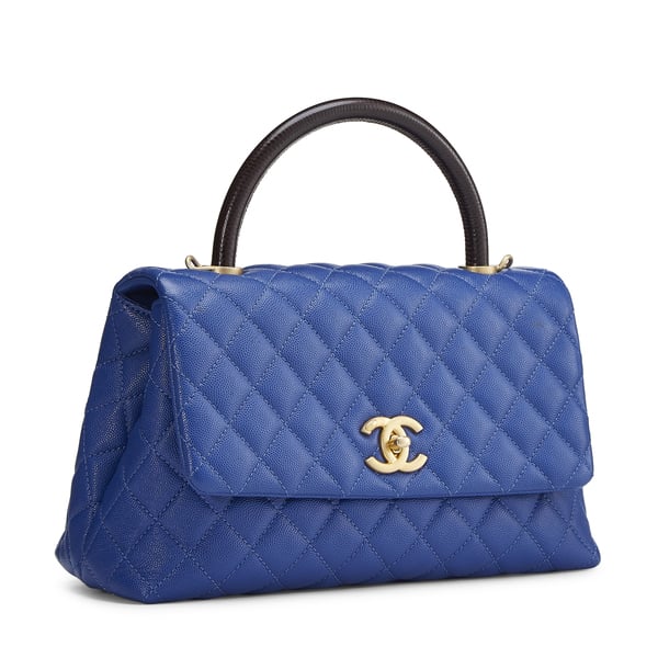What Goes Around Comes Around Chanel Blue Caviar Coco Handle Bag Medium goop