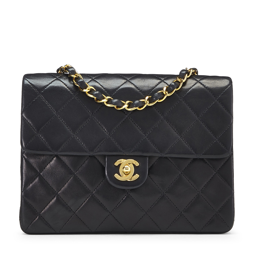What Goes Around Comes Around Chanel Black Lambskin Half-flap Bag